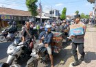 Polisi-Peduli-:-Polres-Bondowoso-Berbagi-Air-Minum-kepada-Warga-yang-Antri-di-SPBU